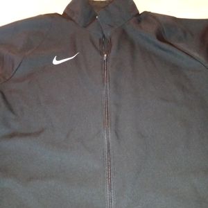 Men's long sleeve zip up jacket by Nike size Medium Dri-Fit like new